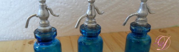 Réalisations spéciales Didange:
accessoire pour vitrine de bar:
siphons.